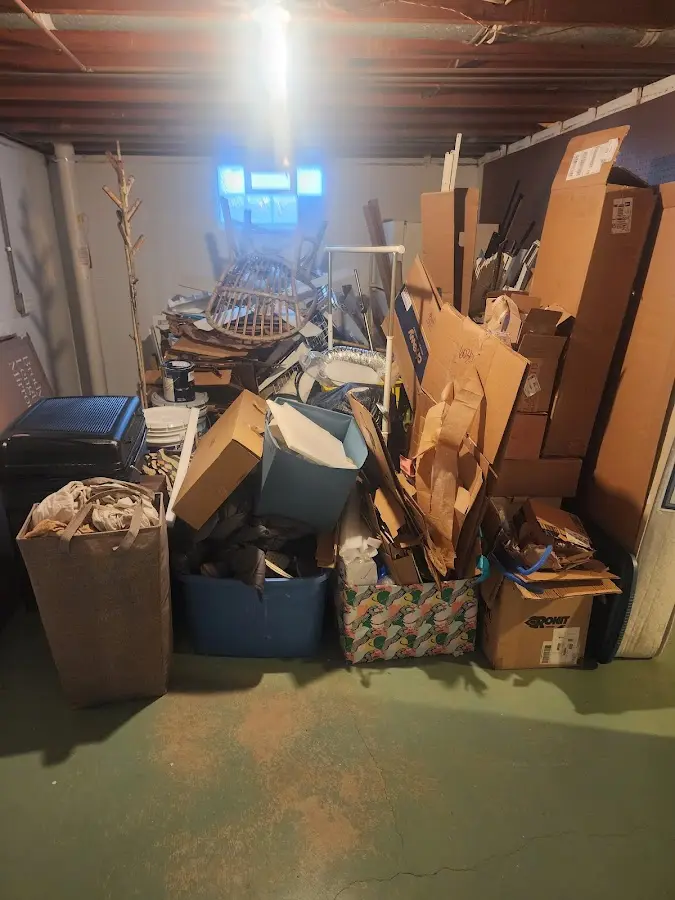 Roll-off dumpster container at job site for 2 Yard Dumpster Rental in Barnesville